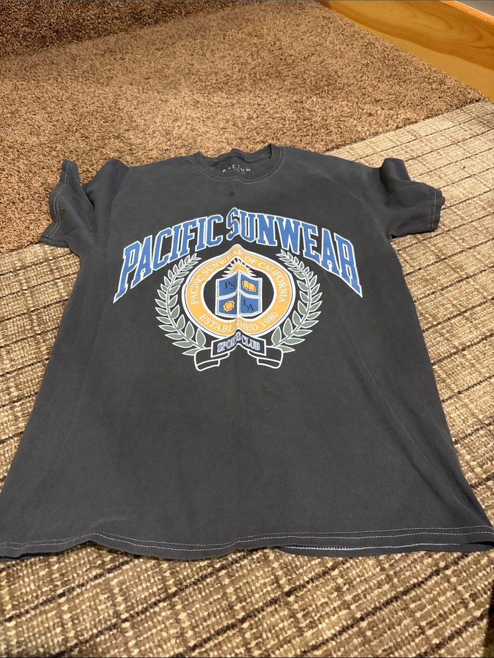 Pacific Sunwear Charcoal Graphic Crest Tee with Blue Accents